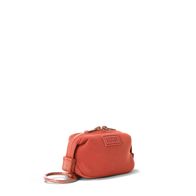 Dagne Dover Hunter Keychain in a poppy, vintage wash red seen from an angle.