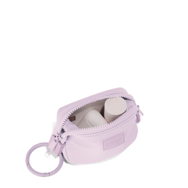 Dagne Dover Hunter Keychain in a soft purple with grey undertones unzipped, showing interior.
