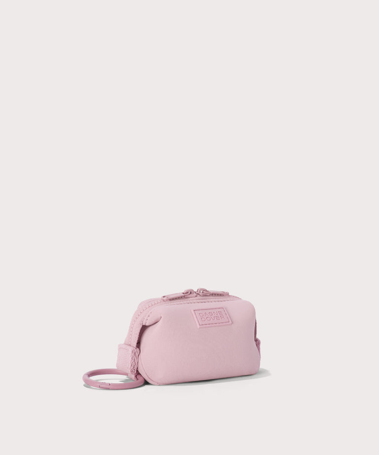 Hunter keychain in a cool, powdery pink with soft grey undertones.  side angle view
