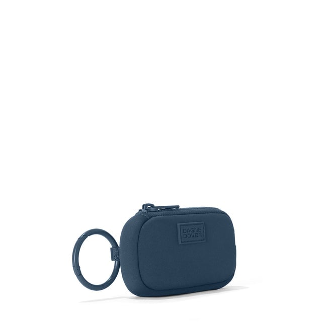 Dagne Dover Mara Keychain in a medium grey-blue with a touch of turquoise seen from an angle.