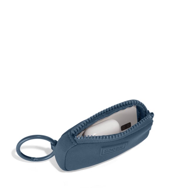 Dagne Dover Mara Keychain in a medium grey-blue with a touch of turquoise unzipped, showing interior.