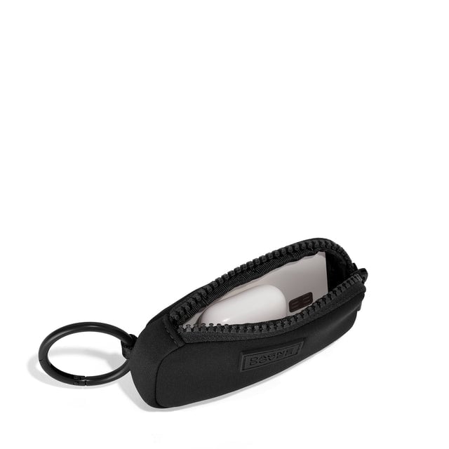 Dagne Dover Mara Keychain in black unzipped, showing interior.