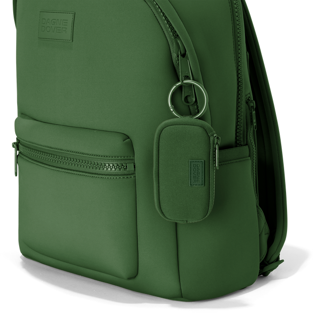 Dagne Dover Mara Keychain in a rich, classic forest green clipped onto a backpack. hover
