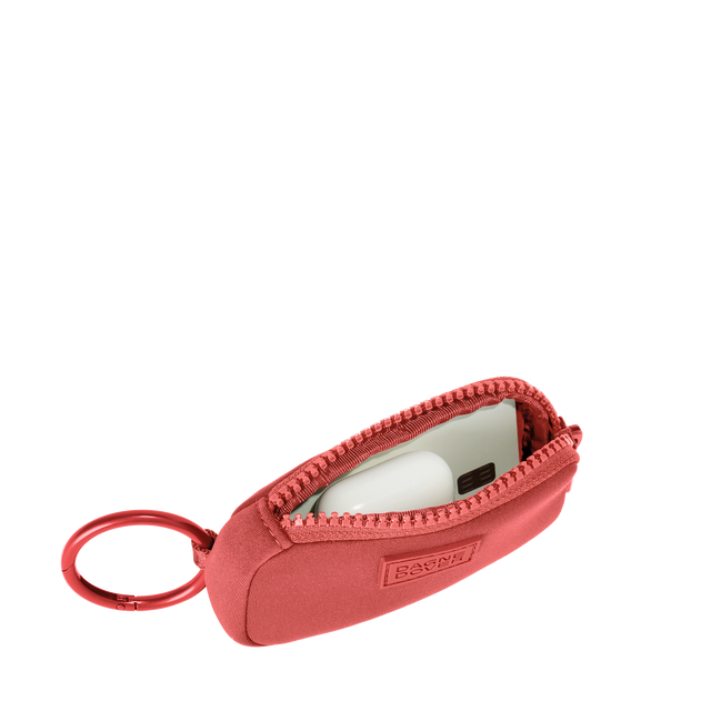 Dagne Dover Mara Keychain in a poppy, vintage wash red unzipped, showing interior.