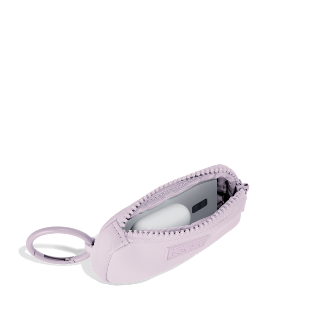 Dagne Dover Mara Keychain in a soft purple with grey undertones unzipped, showing interior.
