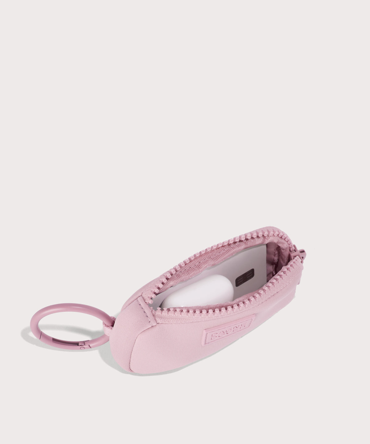 Mara Keychain in a cool, powdery pink with soft grey undertones. . unzipped, top down view. 
