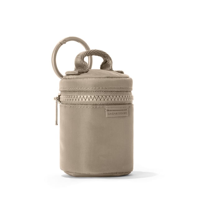 Dagne Dover Mila Keychain in a medium-dark, creamy tan seen from an angle.