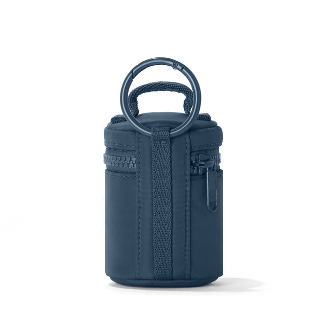 Dagne Dover Mila Keychain in a medium grey-blue with a touch of turquoise seen from the back.