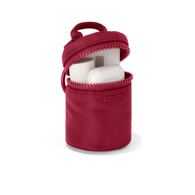 Dagne Dover Mila Keychain in a punchy, saturated deep red unzipped, showing interior.