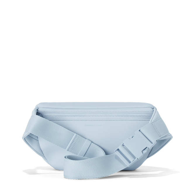 Dagne Dover jax large fanny pack in an airy, lighter sky blue seen from the back.

