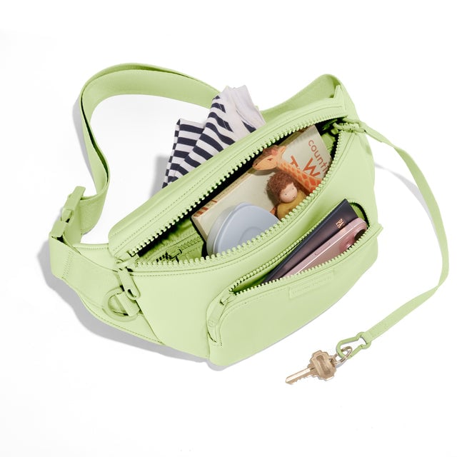 Dagne Dover Jax Large Fanny Pack in Matcha, unzipped.