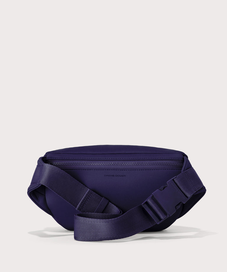 Jax in a jewel-toned, deep blue with strong purple undertones Back view. 
