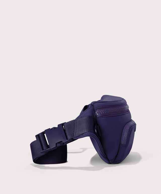 Jax in a jewel-toned, deep blue with strong purple undertones, side angle view
