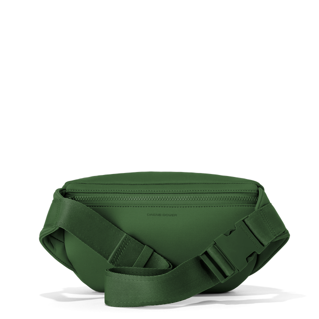 Dagne Dover jax large fanny pack in a rich, classic forest green seen from the back.
