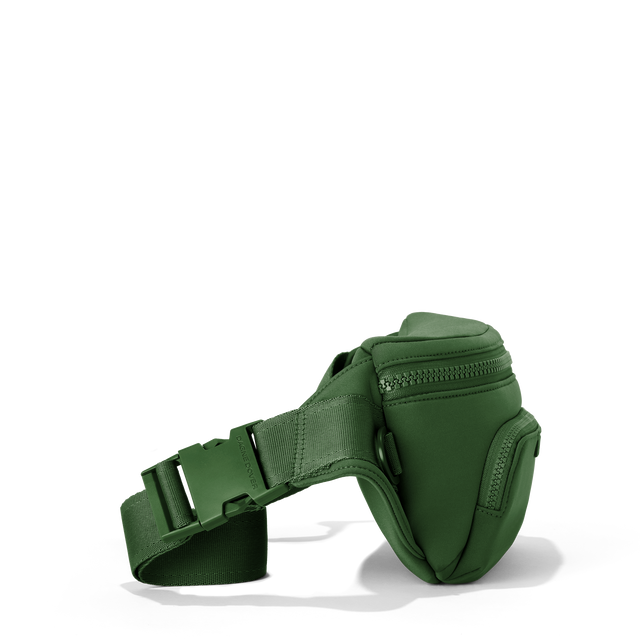 Dagne Dover jax large fanny pack in a rich, classic forest green seen from an angle.

