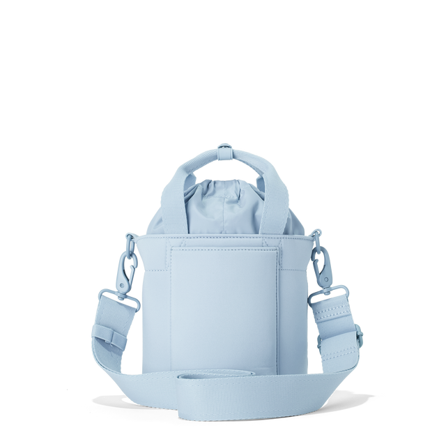 Dagne Dover Nico Bucket Bag in an airy, lighter sky blue, back angle.