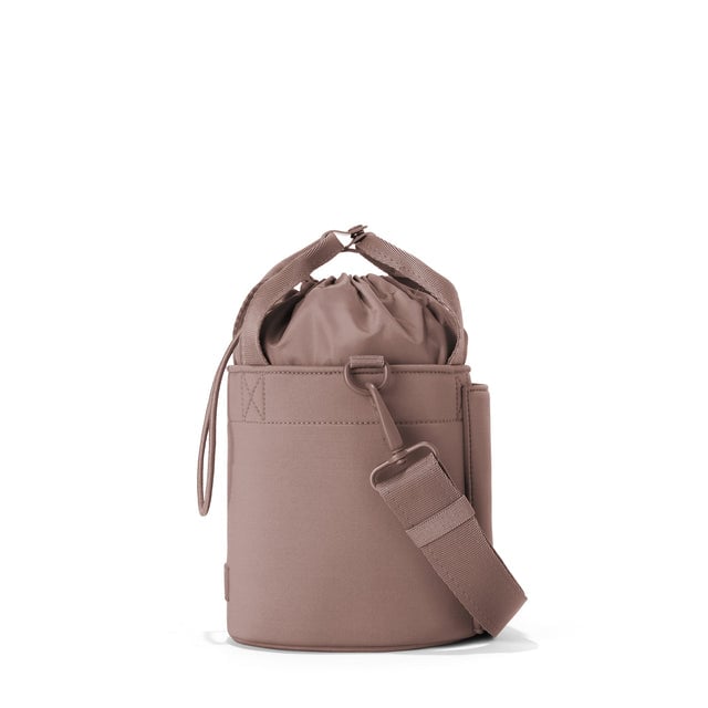 Dagne Dover Nico Bucket Bag in Dune, side angle.