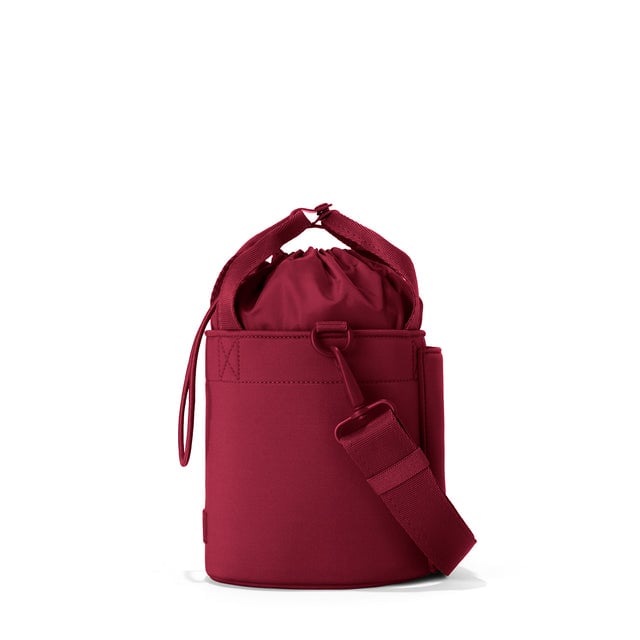 Dagne Dover Nico Bucket Bag in Spice, side angle.