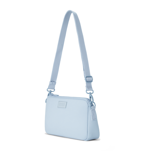 Dagne Dover Nora Shoulder Bag in an airy, lighter sky blue, side angle
