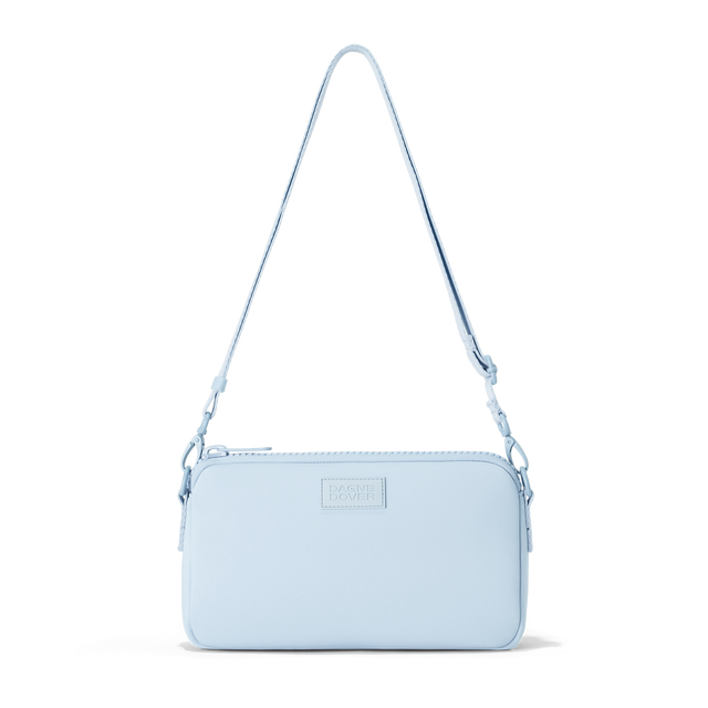 Dagne Dover Nora Shoulder Bag in an airy, lighter sky blue, strap up.
