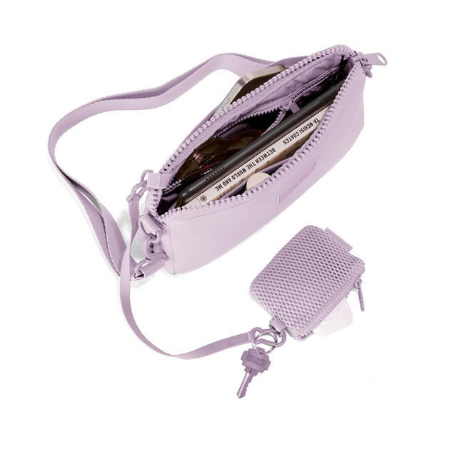Dagne Dover Nora Shoulder Bag in a soft purple with grey undertones, unzipped topdown. hover
