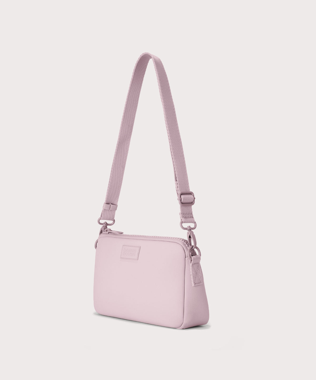 Nora shoulder bag in a cool, powdery pink with soft grey undertones., side angle view
