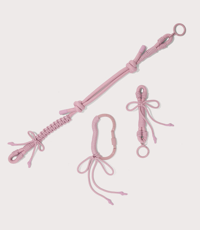 corded strap separated in  a cool, powdery pink with soft grey undertones.