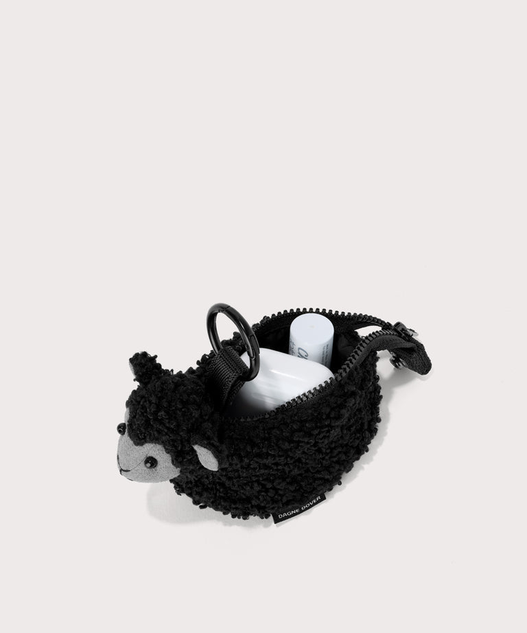 Black sheep keychain in a saturated, jewel-toned deep green with bold blue undertones . unzipped, top down view.  In a  Faux Shearling  a soft, wool-like plush made with recycled materials
