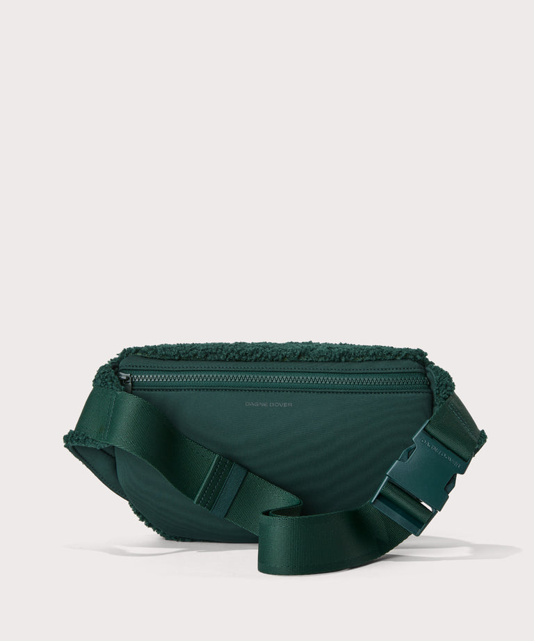 Jax fanny pack in a saturated, jewel-toned deep green with bold blue undertones.  Back view.  In a  Faux Shearling  a soft, wool-like plush made with recycled materials
