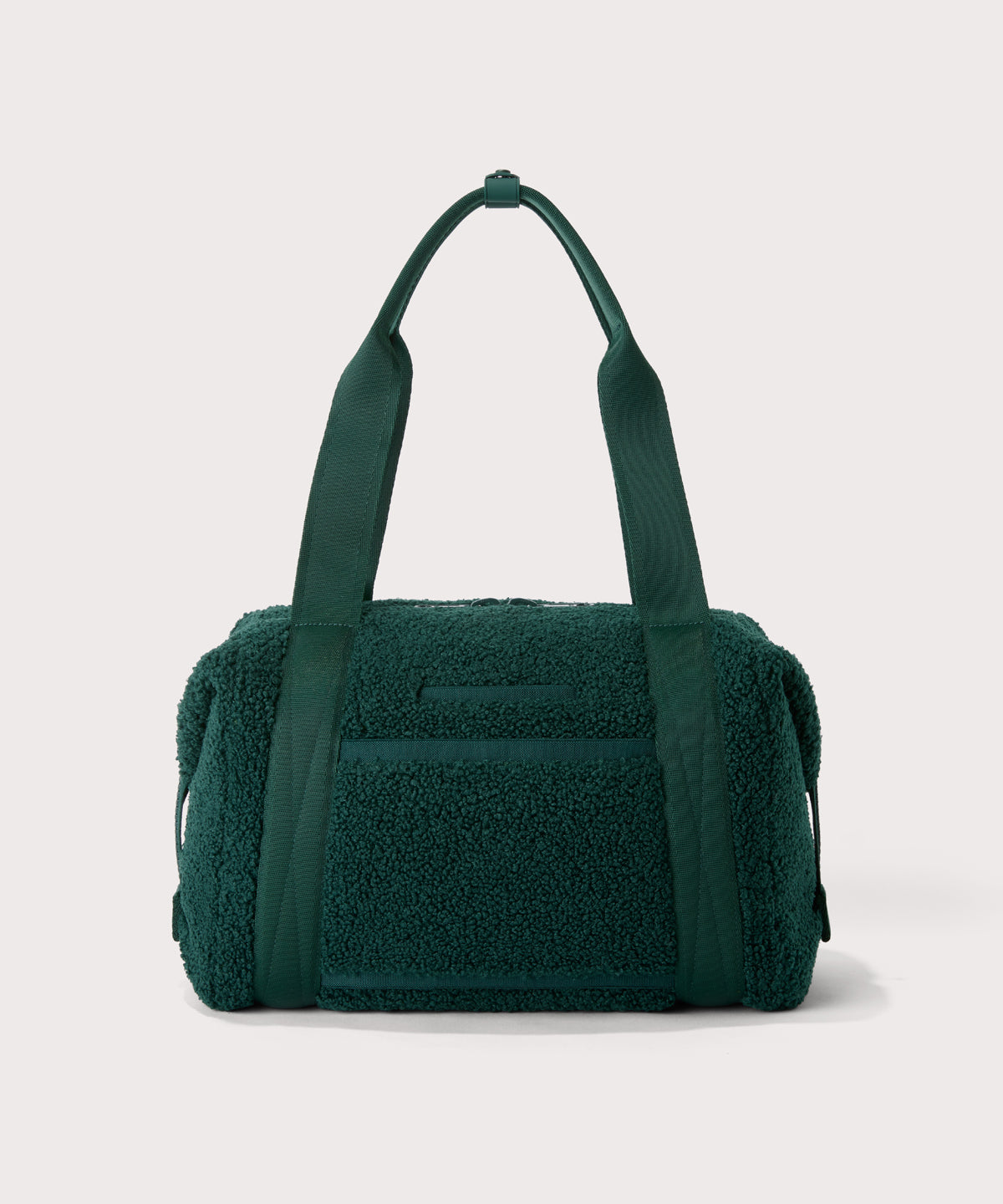 Medium landon carryall in a saturated, jewel-toned deep green with bold blue undertones.  Back view.  In a  Faux Shearling  a soft, wool-like plush made with recycled materials
