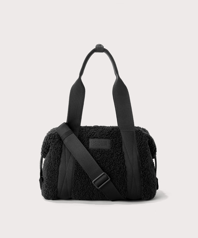 small landon carryall in a black. In a  Faux Shearling  a soft, wool-like plush made with recycled materials
