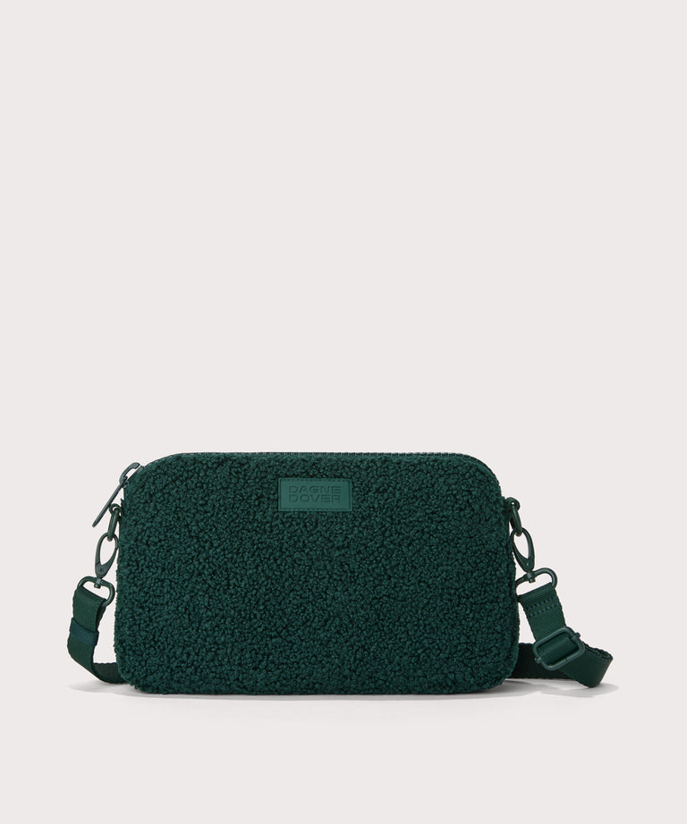 nora shoulder bag in a saturated, jewel-toned deep green with bold blue undertones. In a  Faux Shearling  a soft, wool-like plush made with recycled materials
