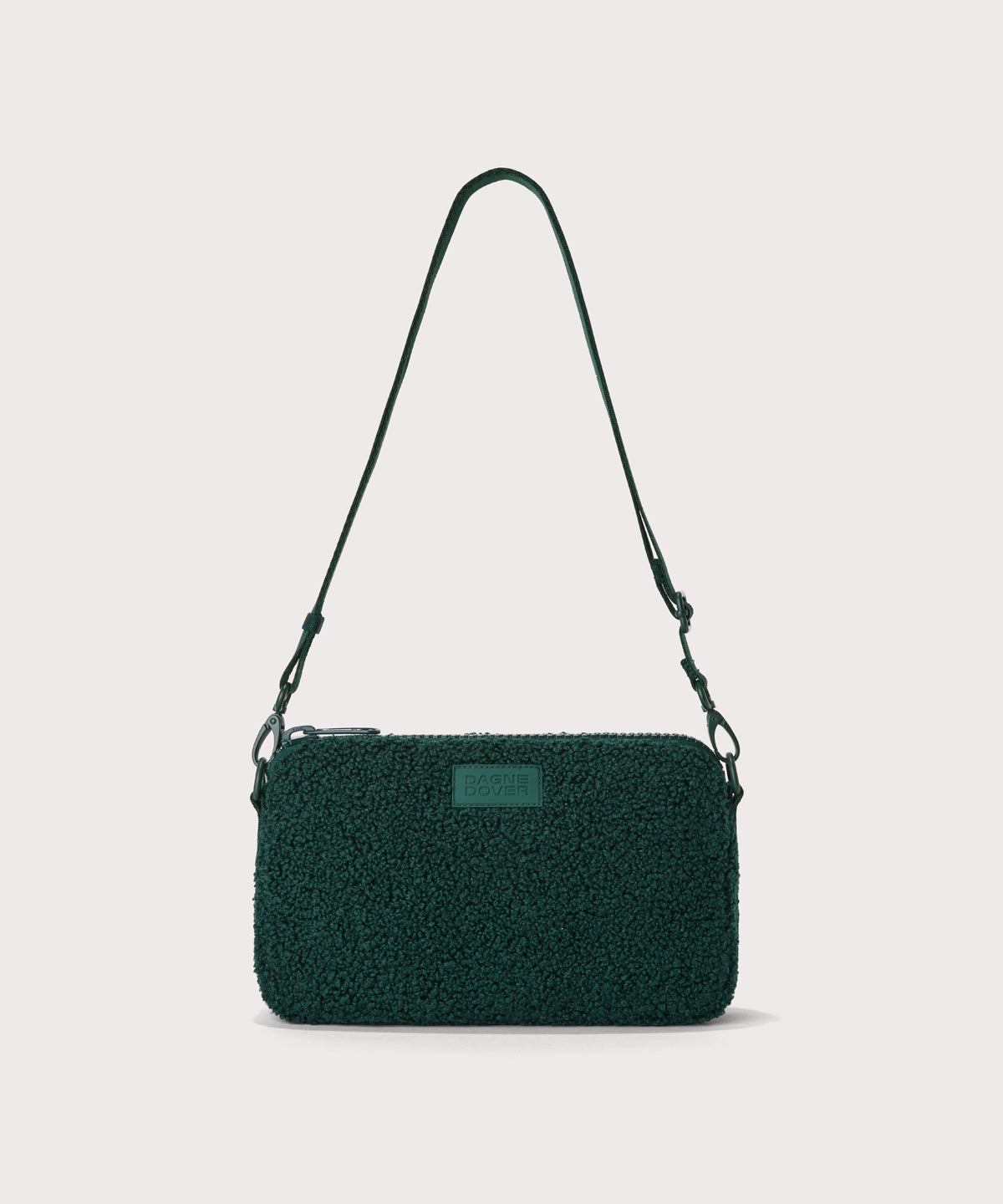 nora shoulder bag in a saturated, jewel-toned deep green with bold blue undertones. In a  Faux Shearling  a soft, wool-like plush made with recycled materials
