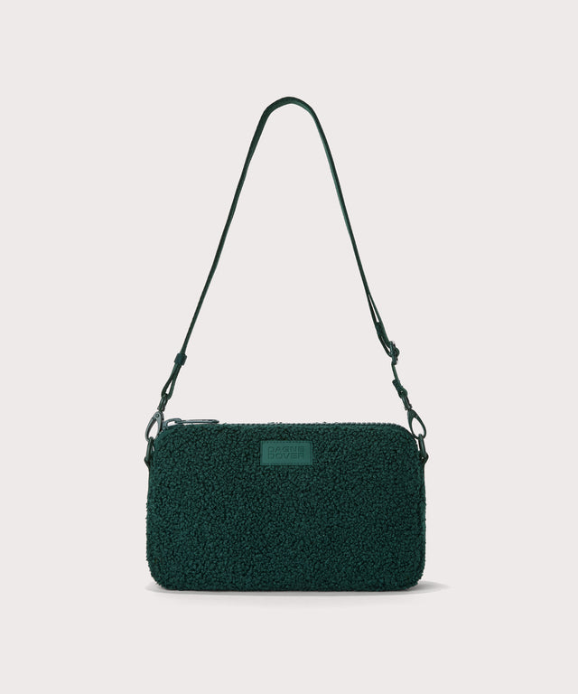 nora shoulder bag in a saturated, jewel-toned deep green with bold blue undertones. In a  Faux Shearling  a soft, wool-like plush made with recycled materials
