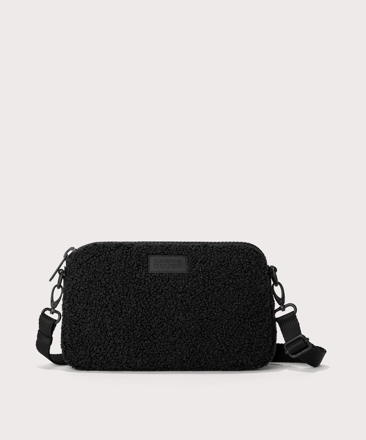 nora shoulder bag in a black. In a  Faux Shearling  a soft, wool-like plush made with recycled materials
