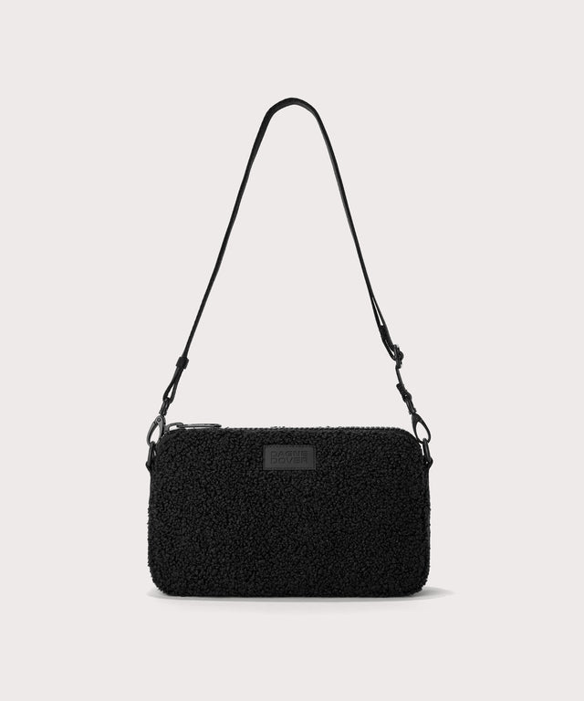 nora shoulder bag in a black. In a  Faux Shearling  a soft, wool-like plush made with recycled materials
