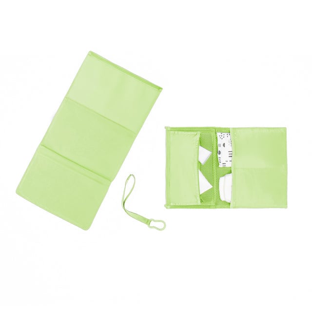 hover - Dagne Dover Joey Changing Kit in matcha green unfolded, revealing the interior zipper pocket and interior slip pockets.