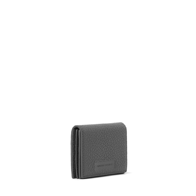 Dagne Dover Accordion Card Case in grey seen from an angle.