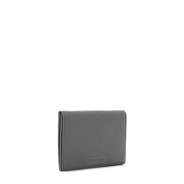Dagne Dover Accordion Travel Wallet in grey seen from an angle.