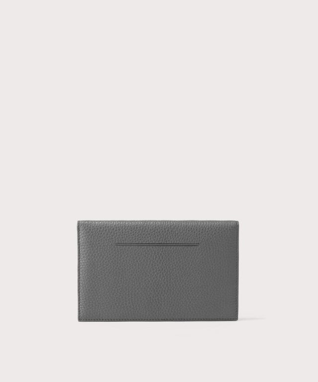 dagne-2025-Dagne Dover Accordion Travel Wallet in grey, revealing the external card slot.
