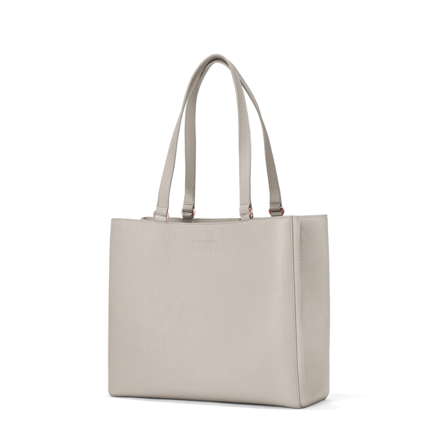 Dagne Dover medium Allyn Tote in grey seen from an angle.