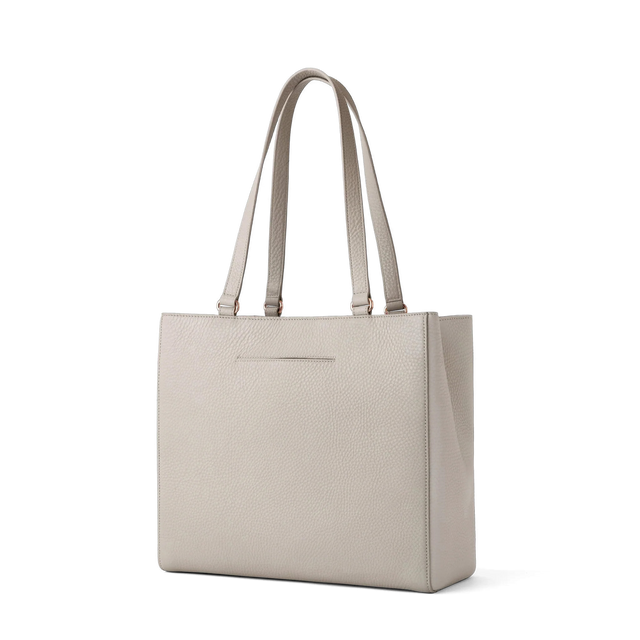 Dagne Dover medium Allyn Tote in grey with the exterior slip pocket.