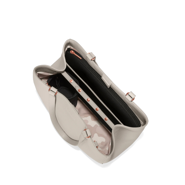 Dagne Dover medium Allyn Tote in grey seen from above, revealing the interior slip pockets and laptop sleeve.