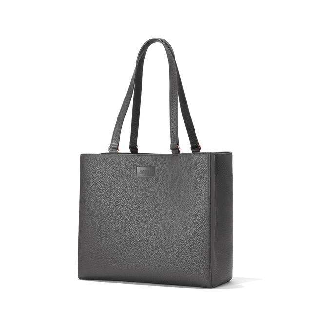 Dagne Dover medium Allyn Tote in medium grey seen from an angle.