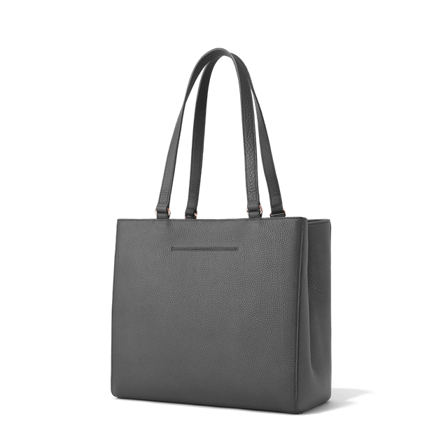 Dagne Dover medium Allyn Tote in medium grey with the exterior slip pocket.