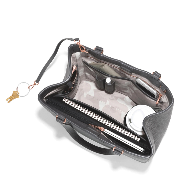 hover - Dagne Dover medium Allyn Tote in medium grey with objects inside the interior pockets.