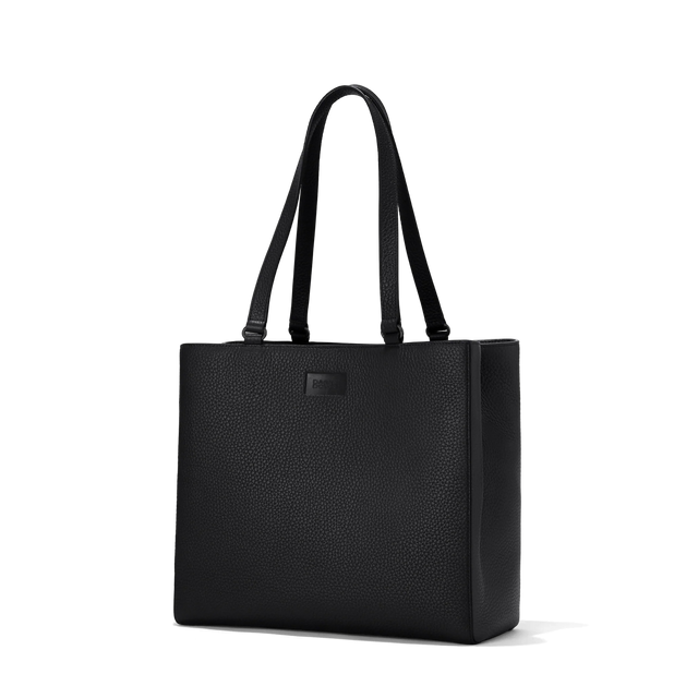 Dagne Dover medium Allyn Tote in black seen from an angle.