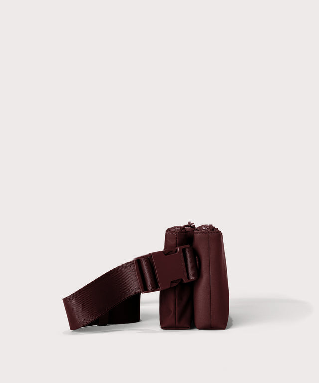 Dagne Dover Bennie Sling in a deep brown with purple undertones seen from the side.