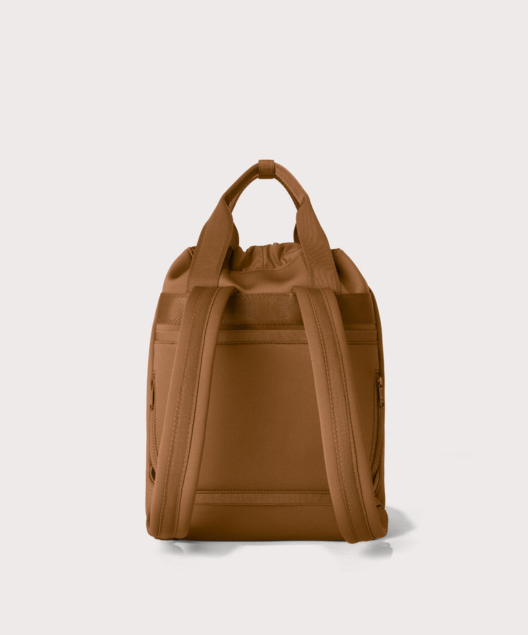 Rhys in a saturated, warm medium-brown with burnt orange undertones Back view. 
