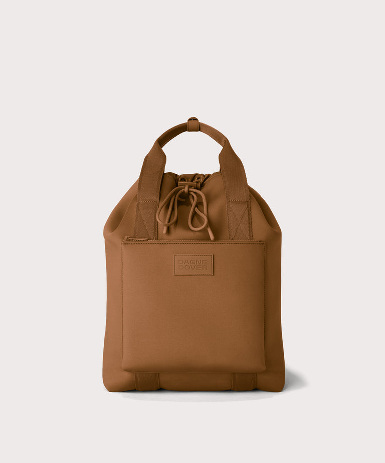 Rhys in a saturated, warm medium-brown with burnt orange undertones
